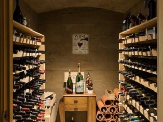 Residential Rust Roughcast Concrete Wine Cellar