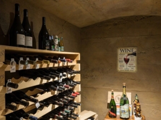 Residential Rust Roughcast Concrete Wine Cellar Vaulted Ceiling