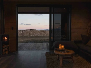 Residential Rust Roughcast Concrete Living Room Log Burner